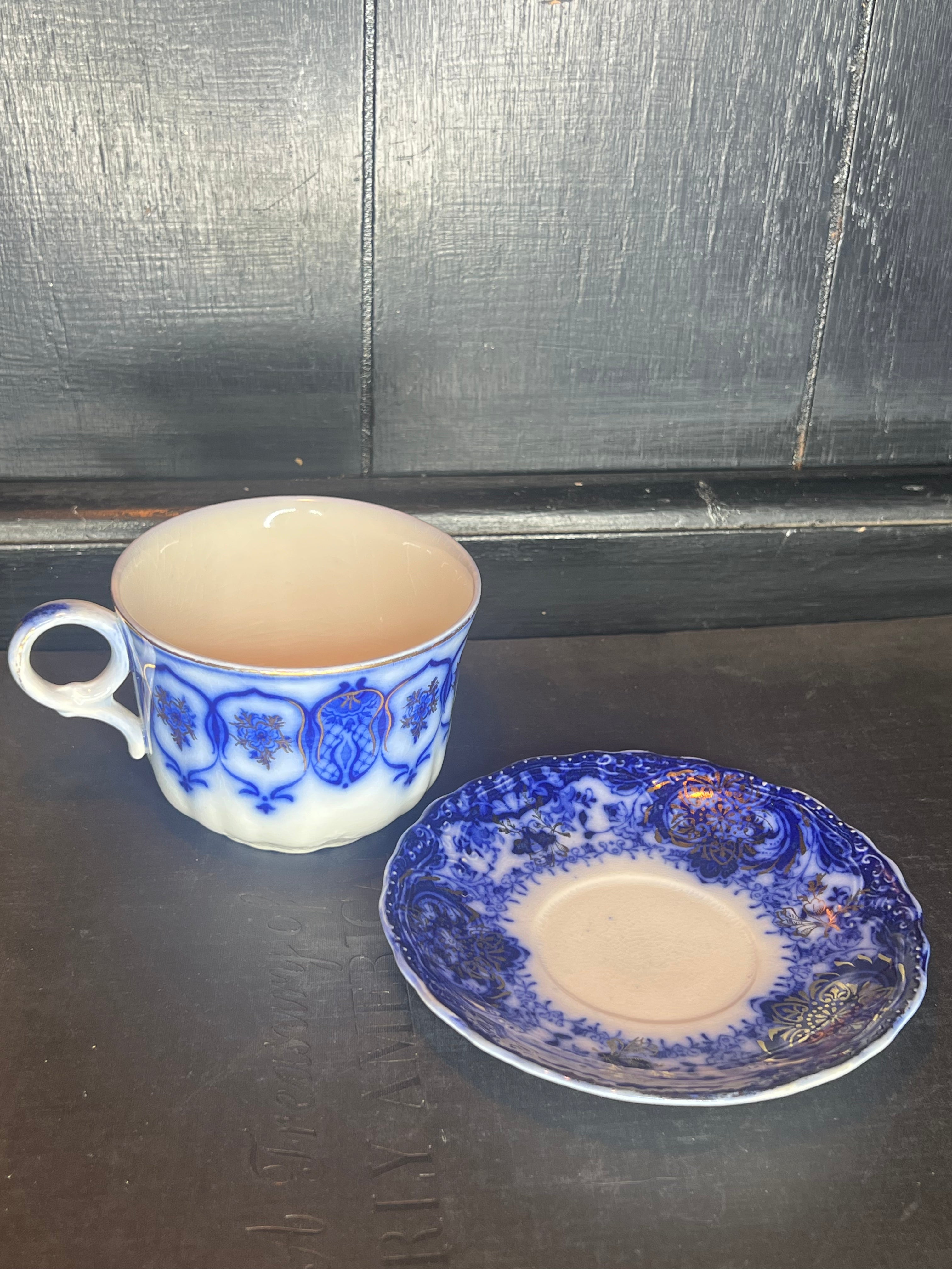 Antique Flow Blue Teacup and Saucer