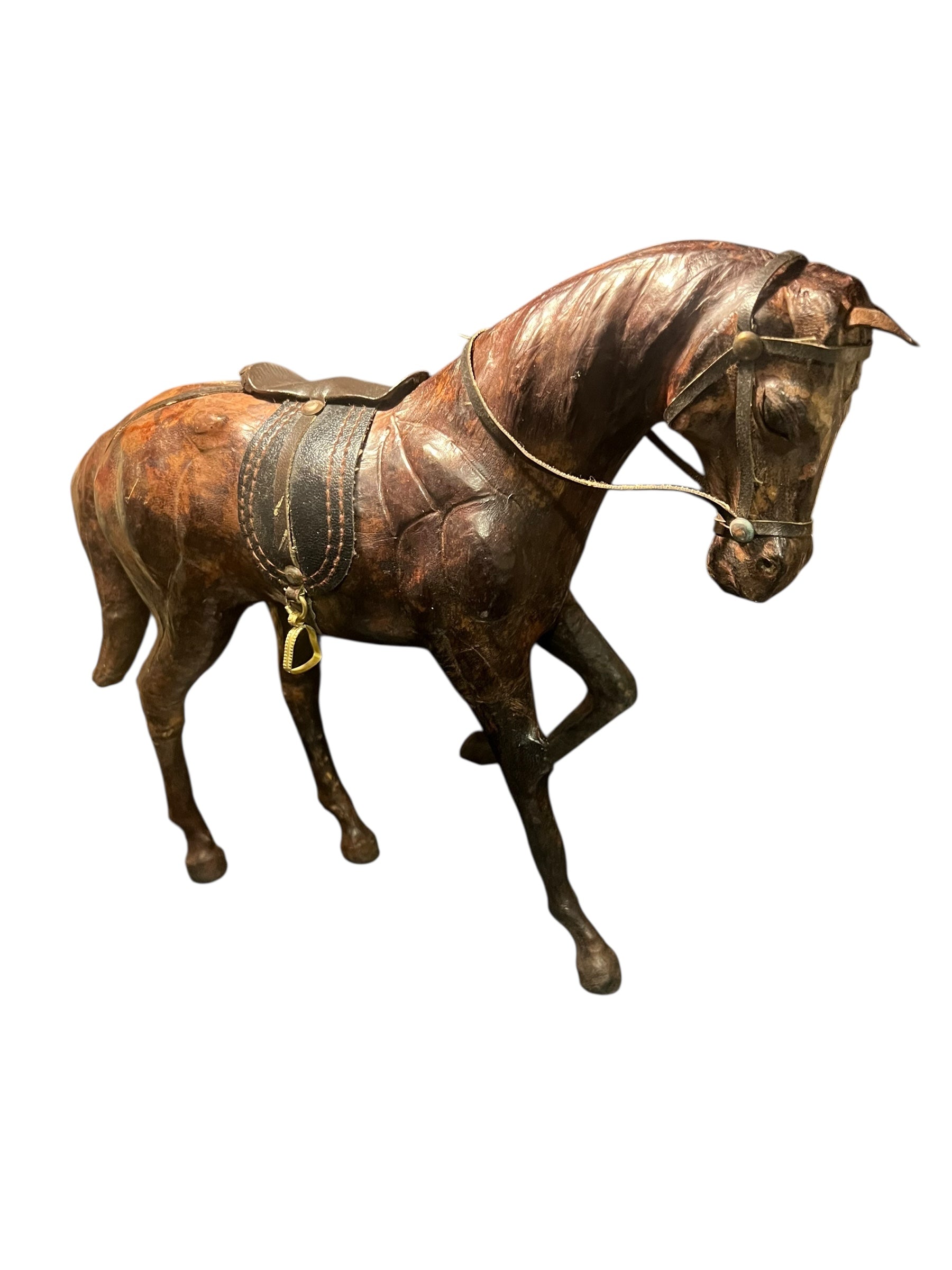 Vintage leather wrapped horse standing