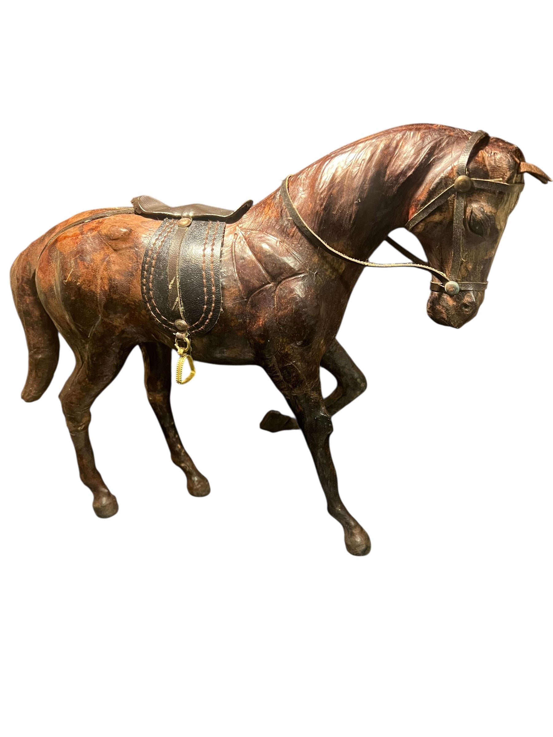 Vintage leather wrapped horse standing