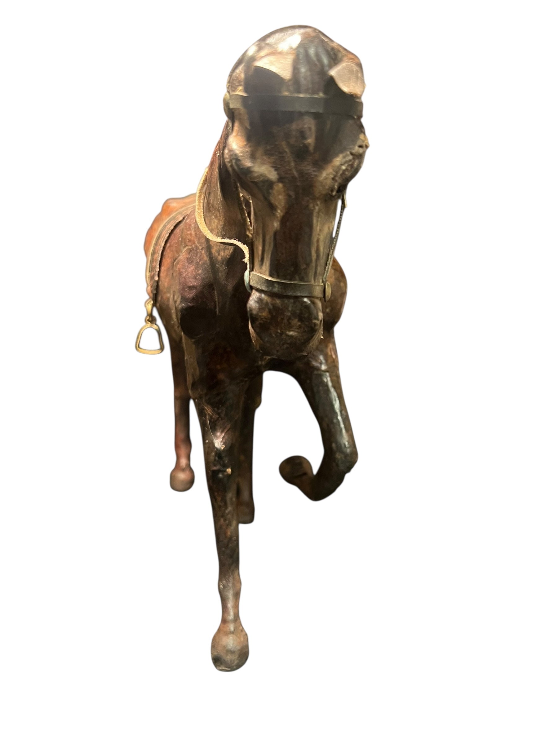 Vintage leather wrapped horse standing